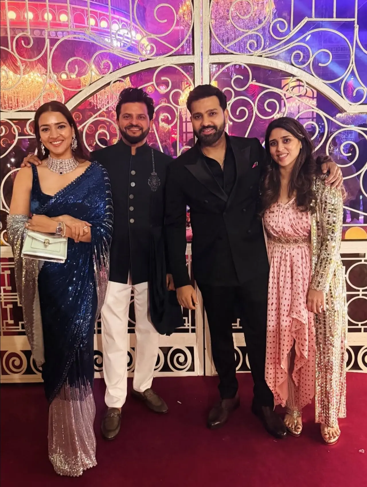 Ace Indian cricketers Suresh Raina and Rohit Sharma strike  pose with their better halves